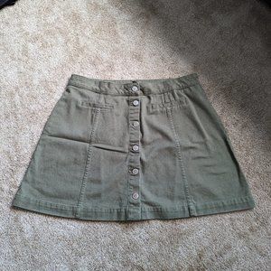 Green denim mini skirt
